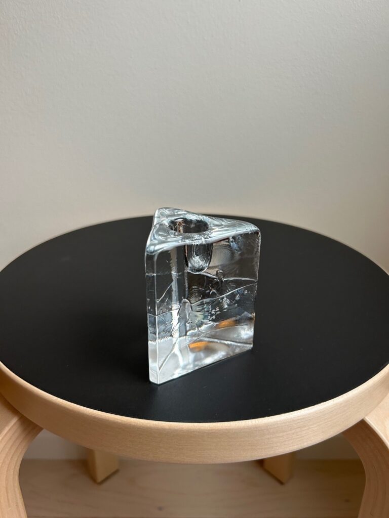Clear vintage iittala Arkipelago glass candle holder in the shape of a triangular prism, designed by Timo Sarpaneva